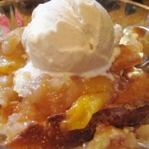 A close up of food, with Cobbler and Ice cream