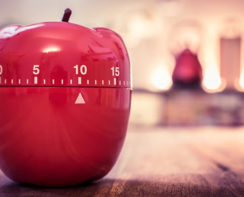 Red Kitchen Egg Timer In Apple Shape concept 10 minutes to declutter