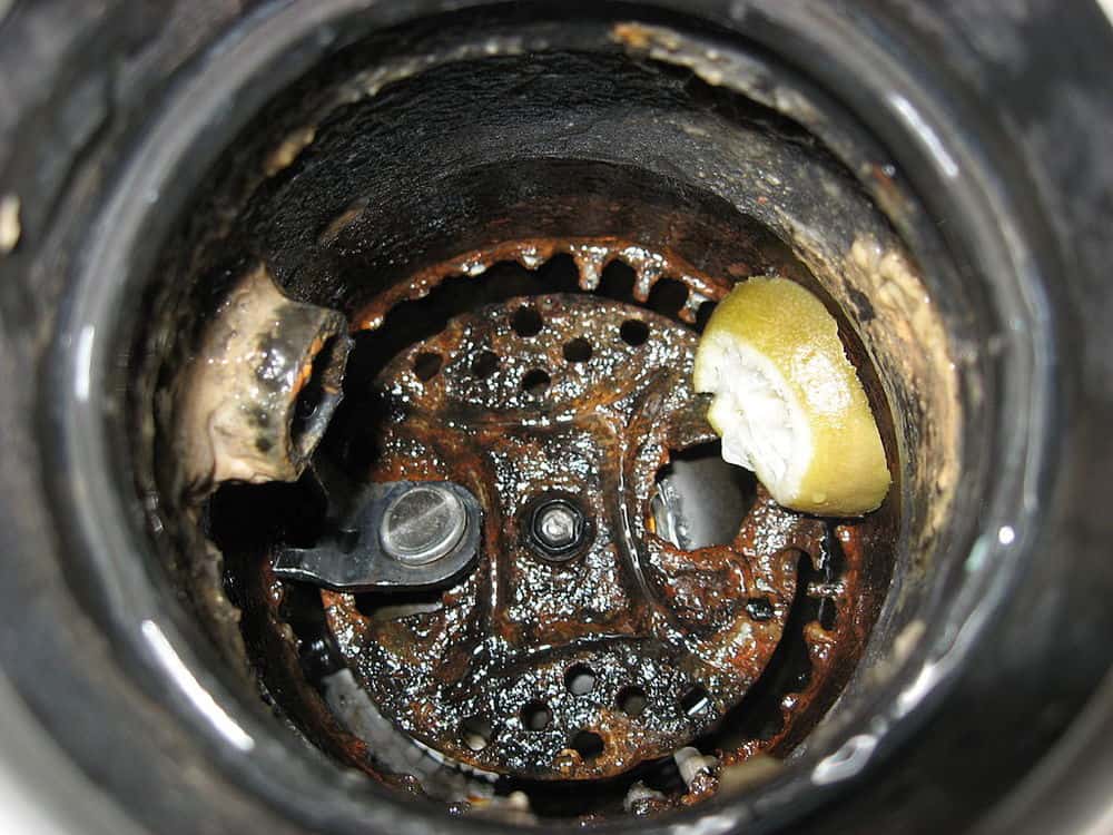 do you have to clean out your garbage disposal