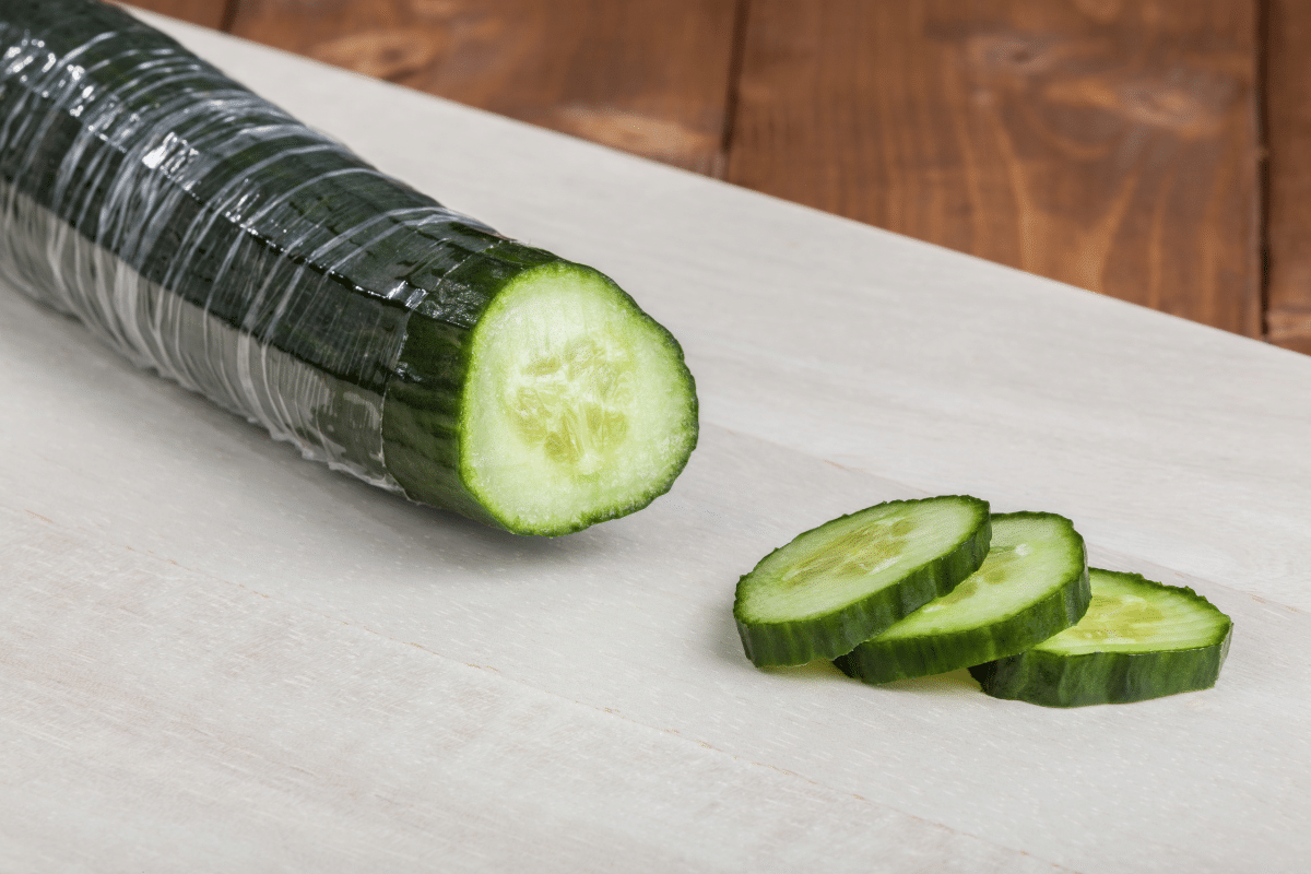 how to store fruit and vegetables cucumber wrapped in plastic sliced