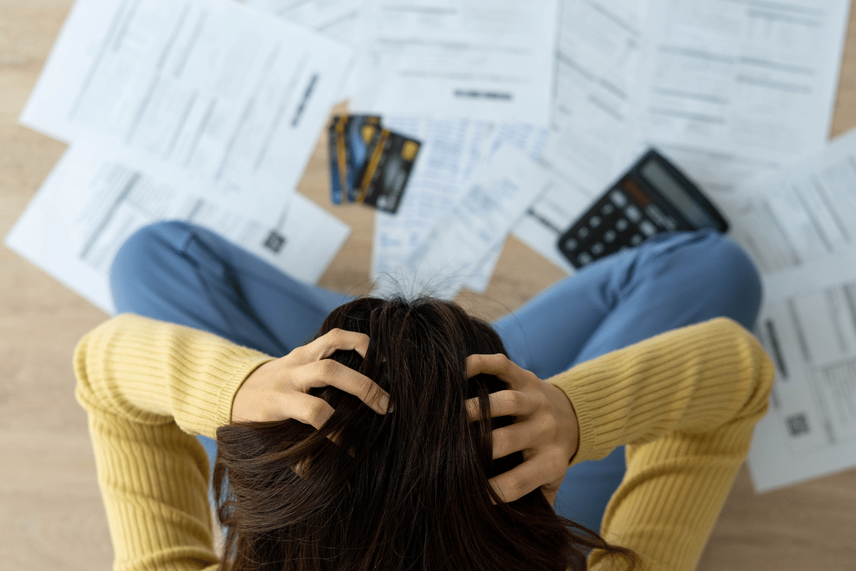 Person Feeling discouraged Over Credit Bills