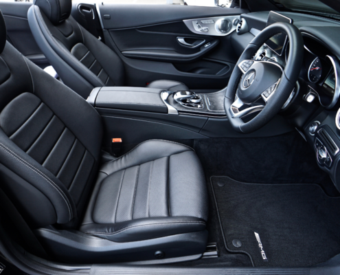 clean car interior black leather car trash can