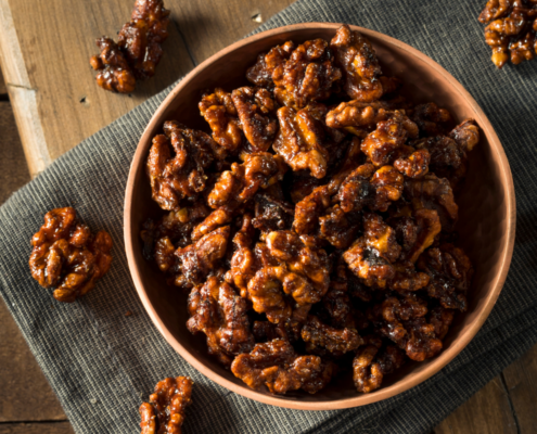 slow cooker sugared walnuts in a bowl