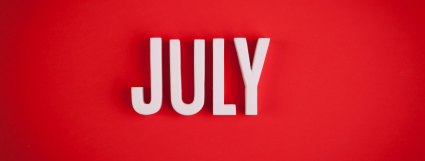 red background july wooden letter best things to buy summer