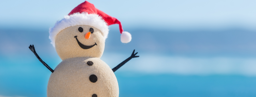 christmas in july summer gift guide amazon prime day snowman on the beach wearing santa hat