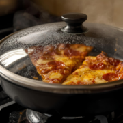 how to reheat leftover pizza in a skillet on stovetop crispy crust cast iron with lid