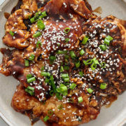 instant pot meal of soy sauce chicken with sesame seeds and green onions