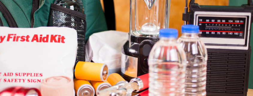 disaster preparedness kit first aid water bottles radio lantern batteries can opener flashlight backpack