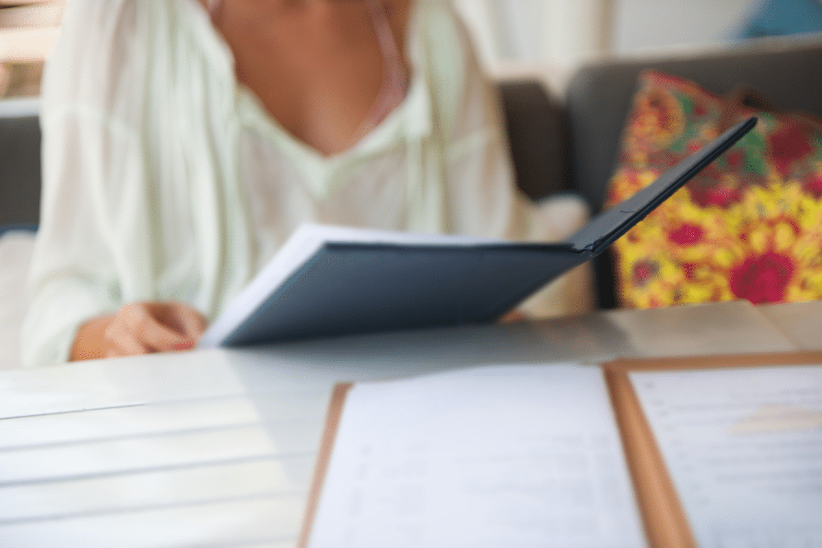 woman holding a restaurant menu psychology