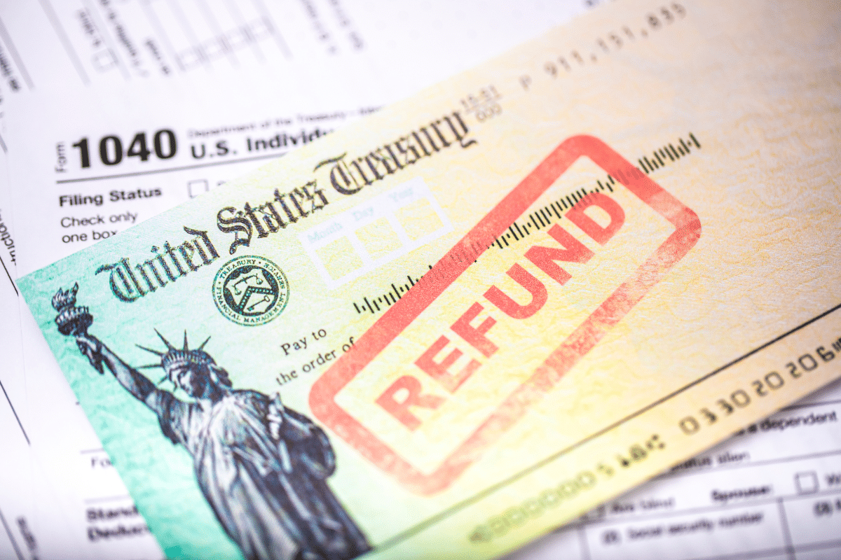 Q Should I use my tax refund to pay down credit card debt or stash it into an emergency fund