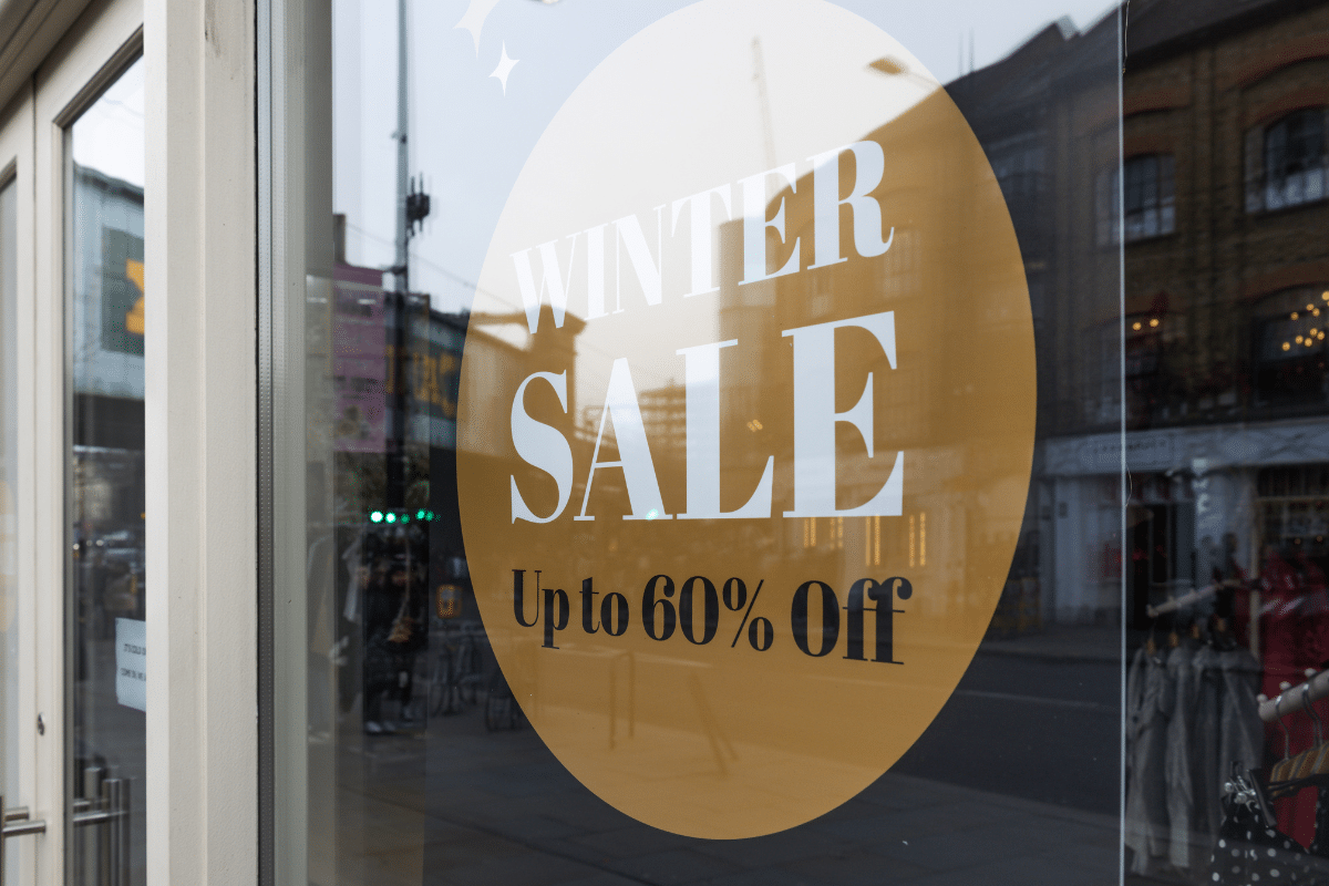 winter sale up to 60% off sign in window clearance february deals