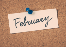february written on paper pinned to cork board news you can use top news articles