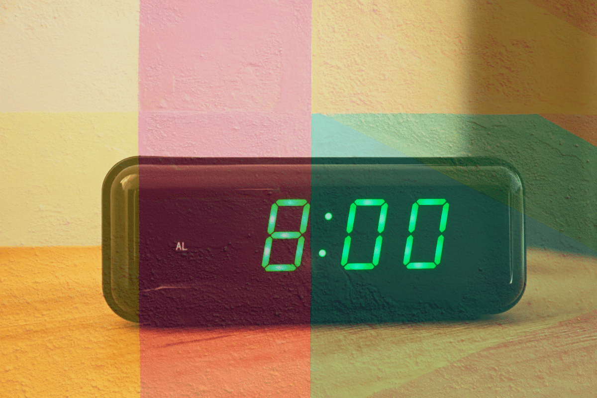 retro digital alarm clock showing 8 o clock go to bed at the same time consistent sleep habits