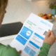 woman holding energy bill 15 minute weekend projects to reduce utility bill costs