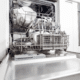 low angle of dishwasher full of clean dishes diy dishwasher cleaner citric acid vinegar