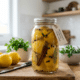 jar of preserved lemons in glass jar in bright contemporary kitchen