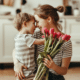 cheap Mother’s Day gift ideas mother holding son with tulip boquet in hands