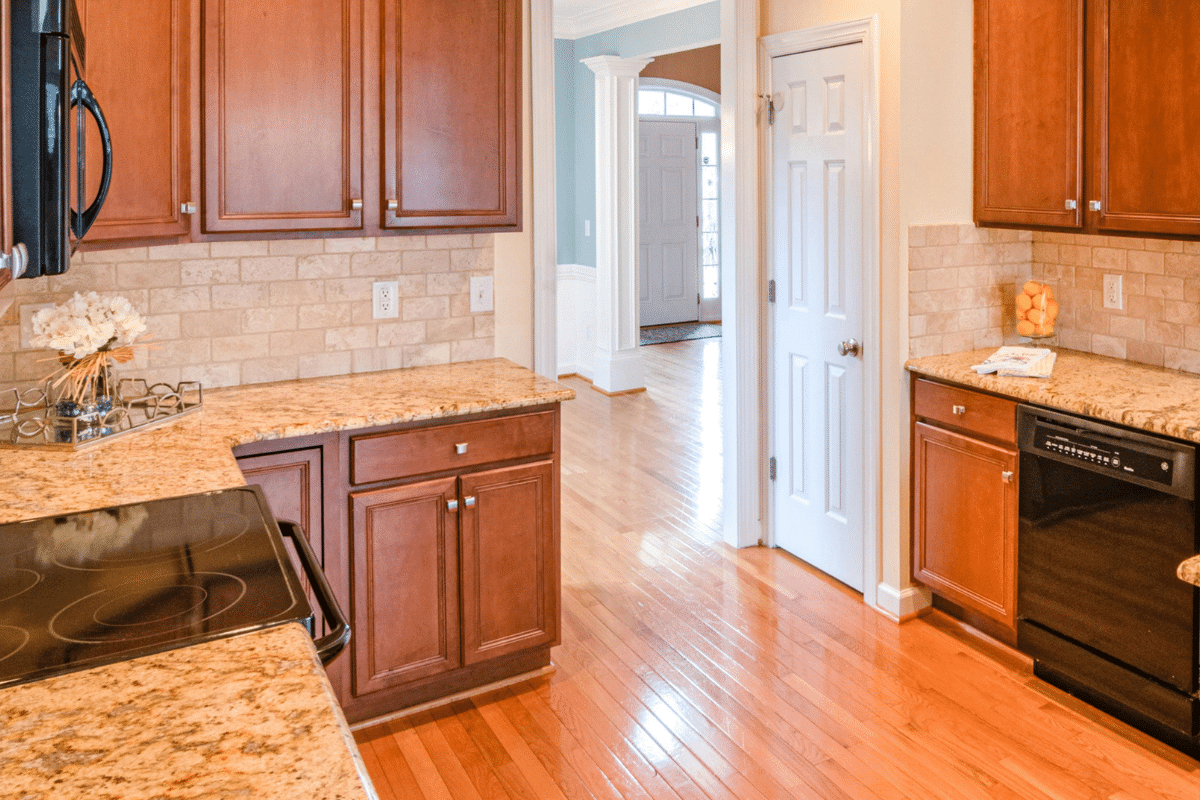 bright modern kitchen with clean wood cabinets diy spray vinegar dish soap olive oil water