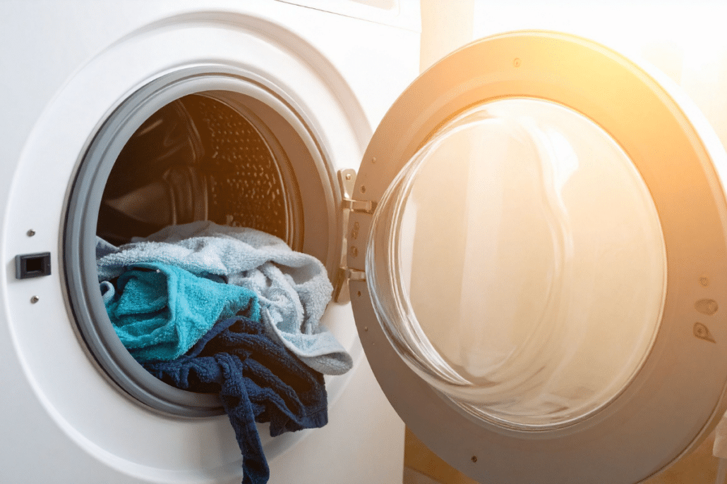diy laundry helpers dryer door open with blue towels