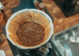 uses for used coffee grounds in the kitchen garden