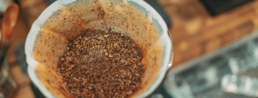 uses for used coffee grounds in the kitchen garden