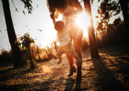give mom a day off mother and son in park at golden hour sunset