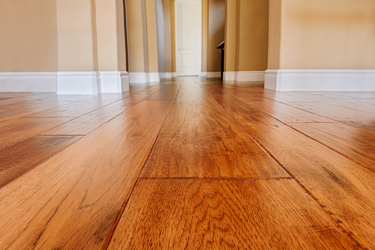 hardwood flooring versus worn carpet to boost home sale price
