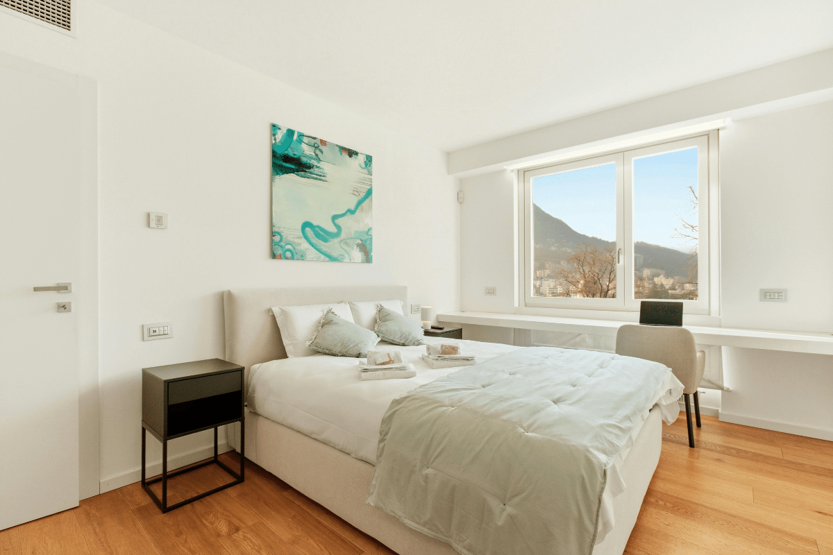 staged bedroom house for sale how much does a room add to the price of a home