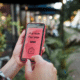 buy now pay later app on iphone in womans hands