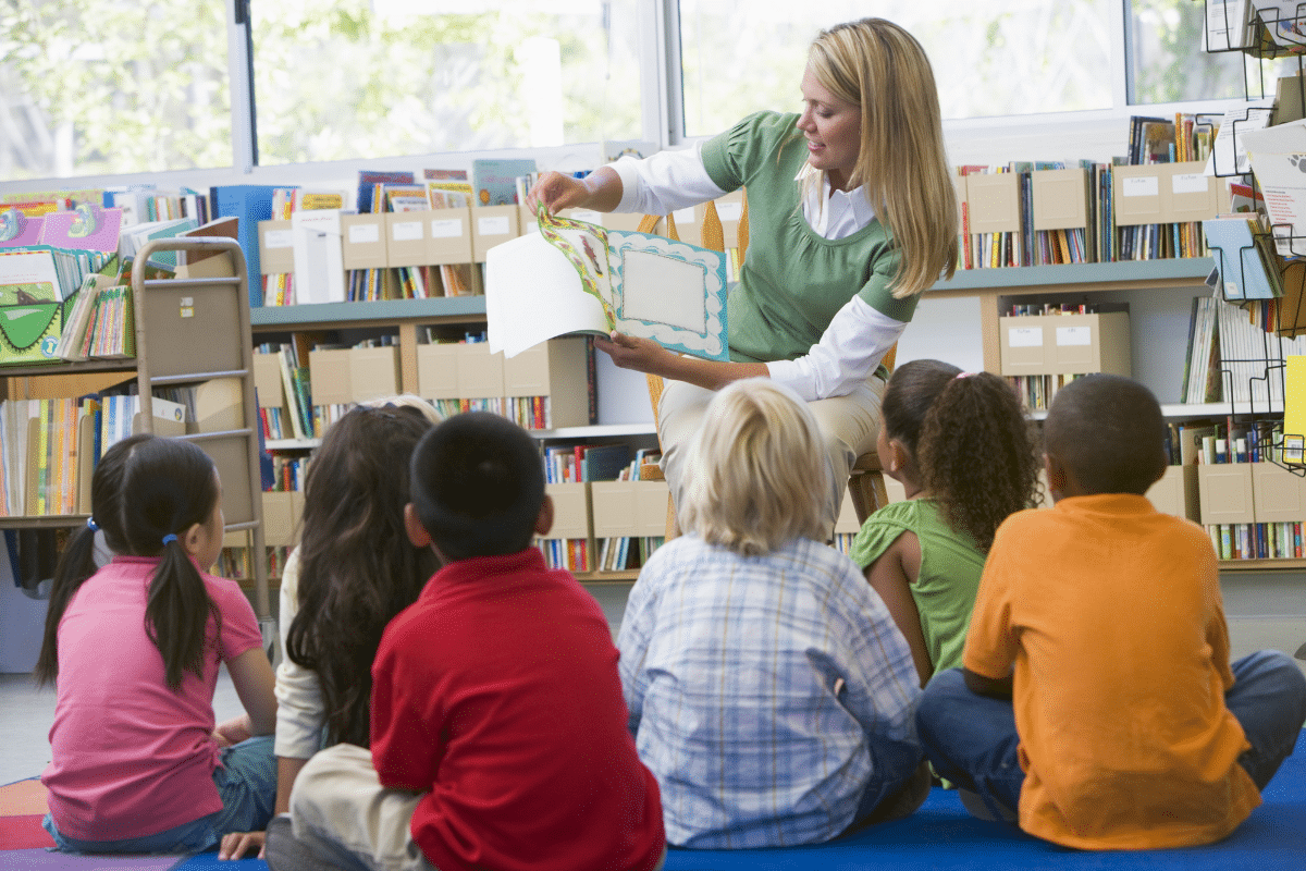 kids listening to story time at the public library