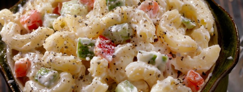creamy macaroni sald in a casserole dish