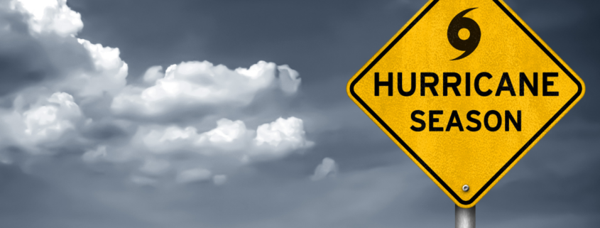 hurricane season prep warning sign with dark cloudy sky in background