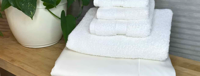 laundry stripping stack of white towels