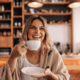 how to splurge on a budget woman drinking fancy coffee luxury treat smiling