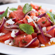 close up of watermelon feta salad with mint and lime
