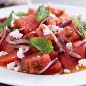 close up of watermelon feta salad with mint and lime