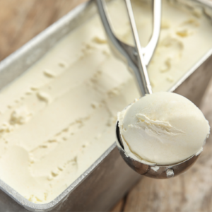 delicious creamy no churn vanilla ice cream scoop and loaf pan