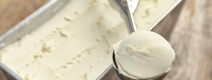 delicious creamy no churn vanilla ice cream scoop and loaf pan