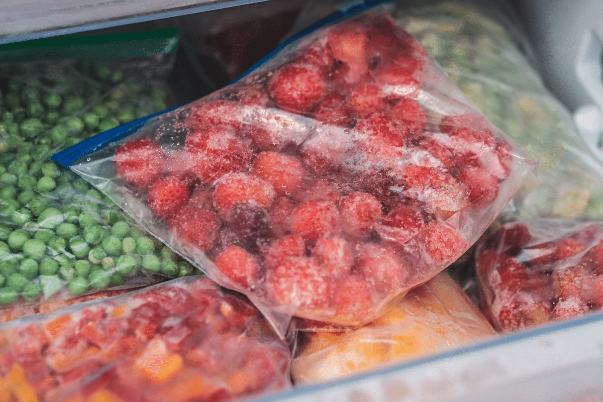 frozen bags of produce strawberries raspberries peas peppers