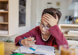budget homework station young boy studying at kitchen dining table