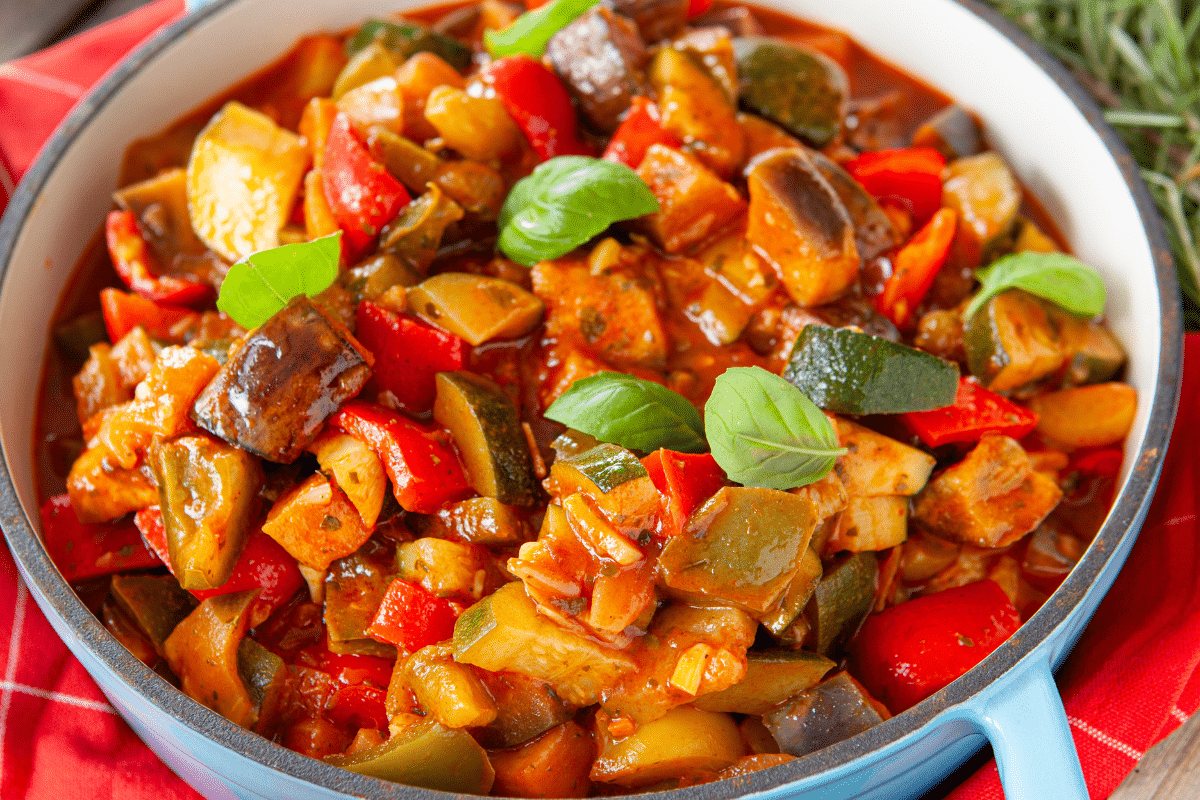 hearty pot of Ratatouille with fresh basil