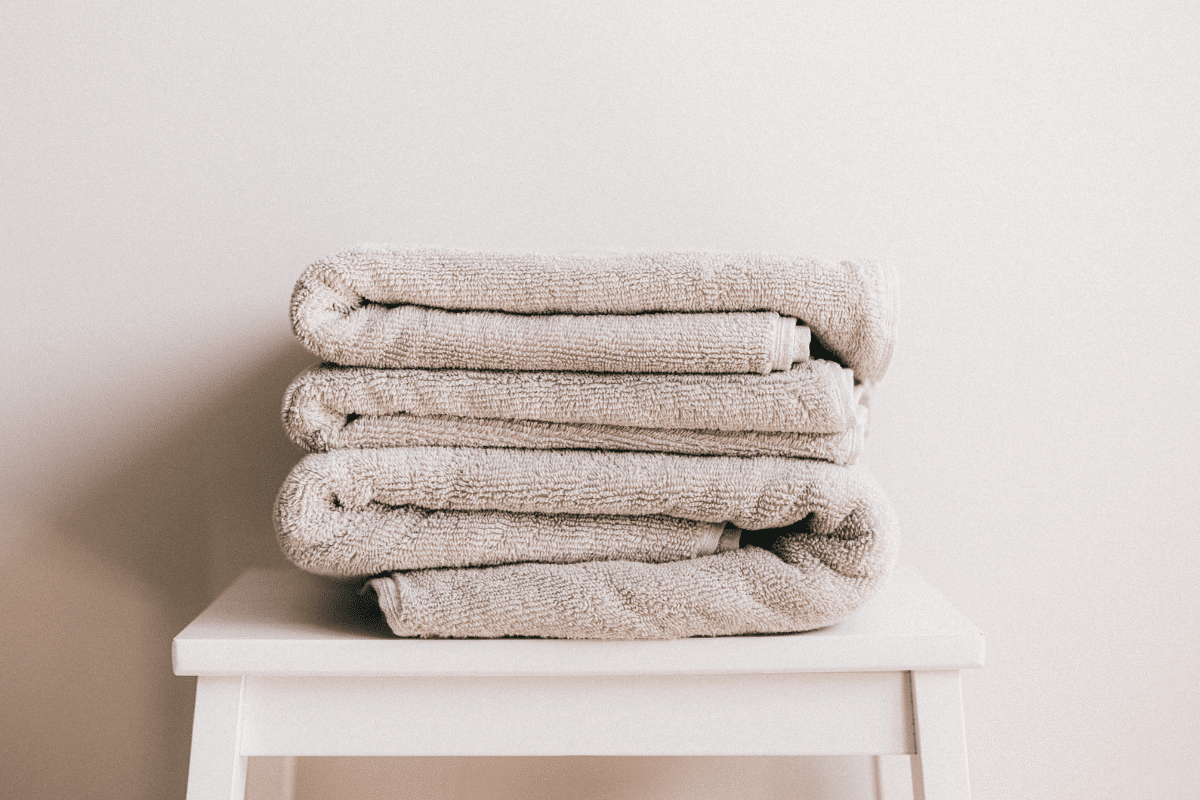 soft towels folded on a white table