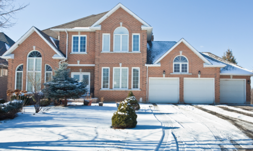 how to winterize your home snowy driveway suburban home