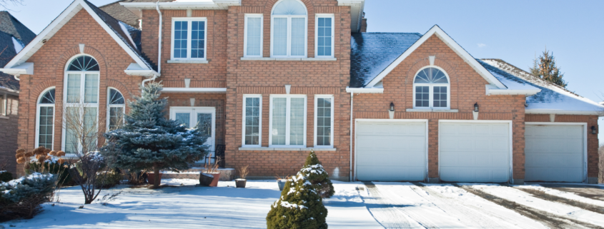 how to winterize your home snowy driveway suburban home