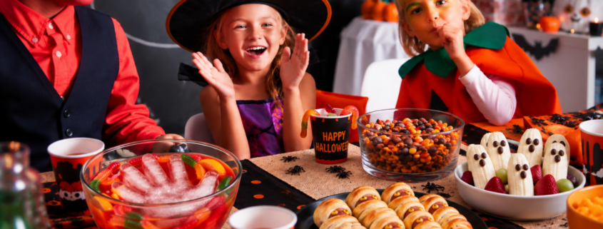 cheap Halloween party snacks for kids punch bowl mummy dogs ghost bananas
