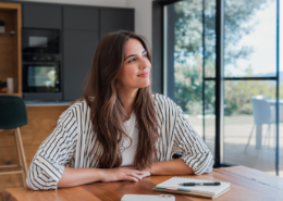 woman dreaming about her financial and life goals