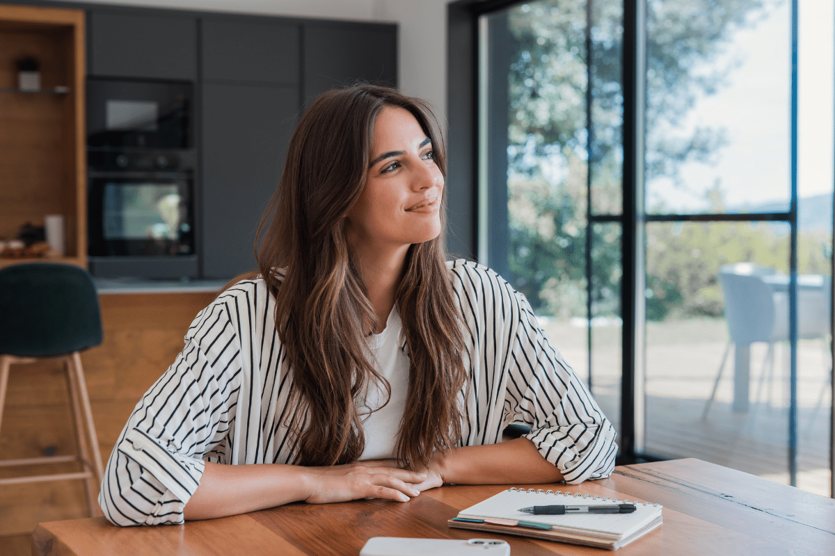 woman dreaming about her financial and life goals