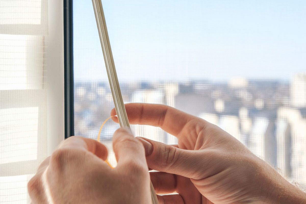 Applying weatherstripping around a window