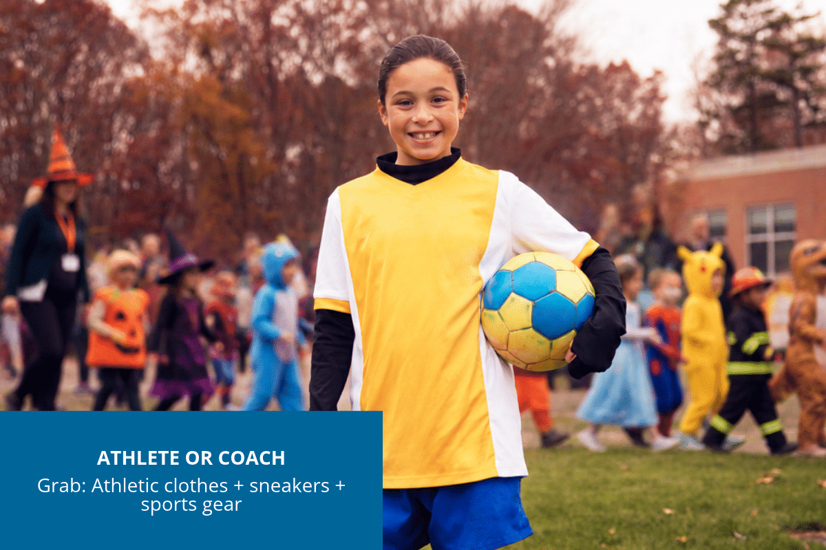 Little girl dressed as a soccer player in athletic clothes and sneakers, holding a soccer ball
