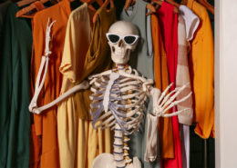 Skeleton with sunglasses in closet